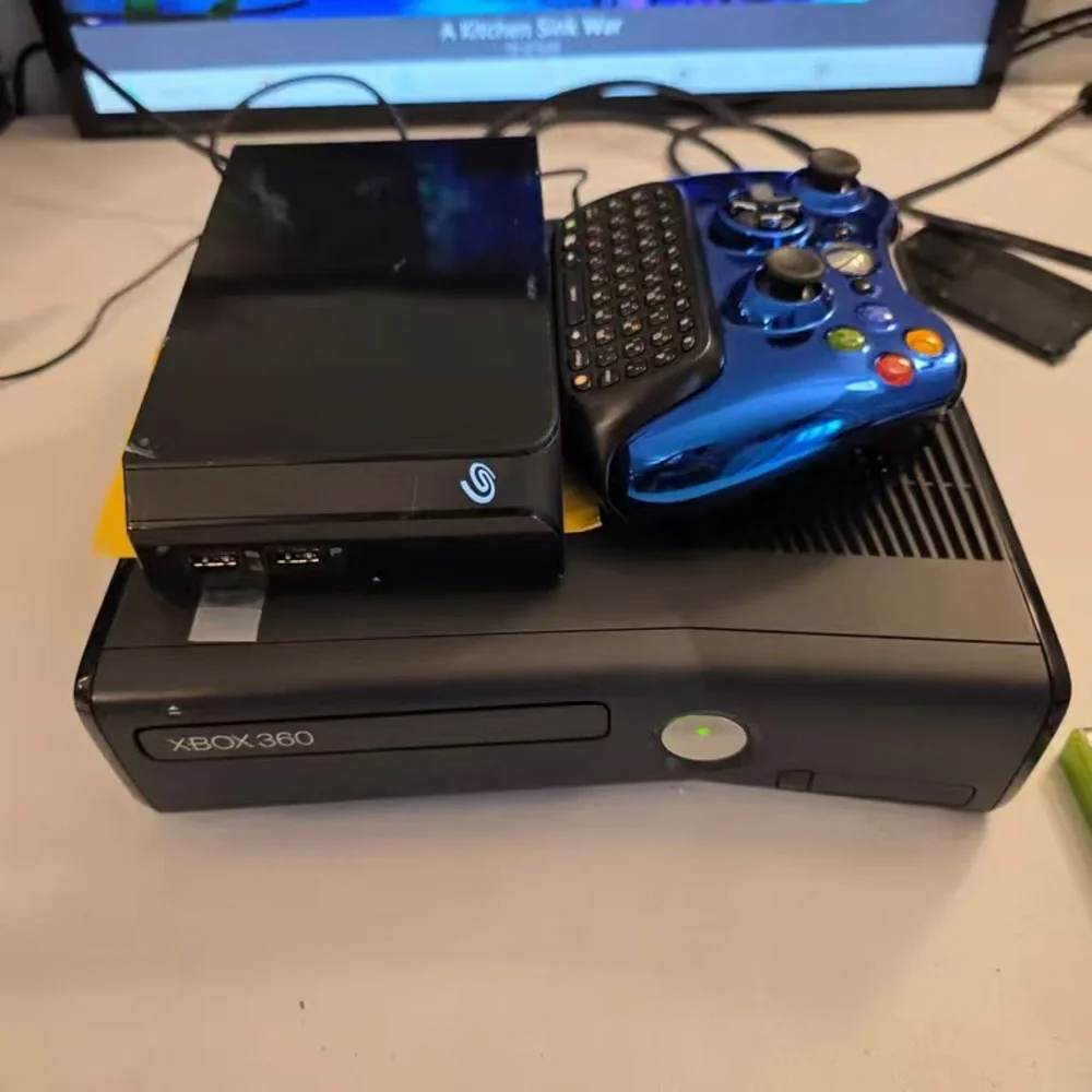 Xbox 360 Console with Blue Controller and Seagate Hard Drive